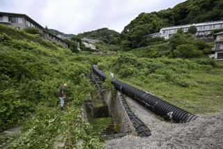 熱海土石流3年、用地買収進まず　帰還2割、市民と行政の確執も